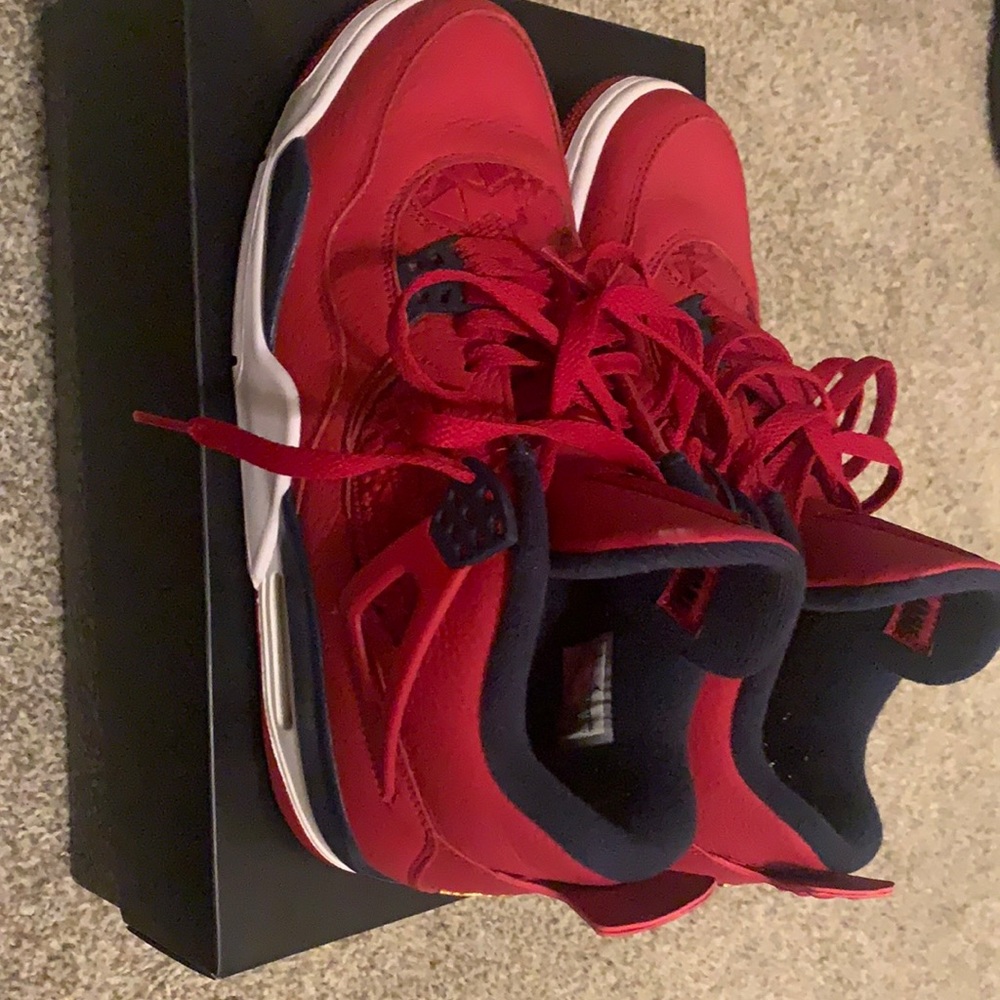 Red size 10 Jordan 4’s fibas